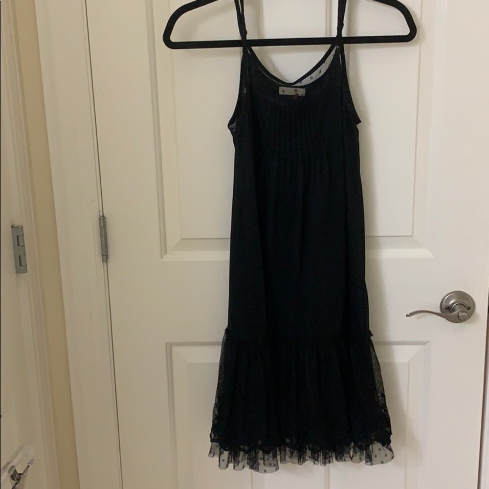 Rye black slip dress with ruffled lace.